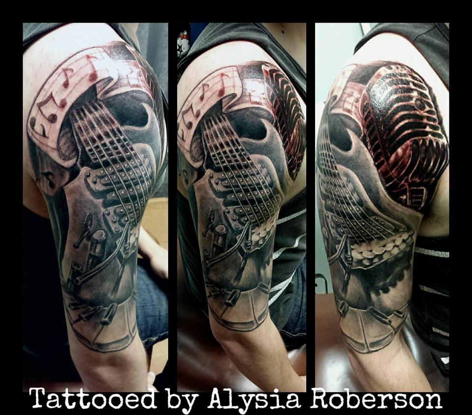 Realistic Guitar With Microphone And Piano Keys Tattoo On Right Half Sleeve