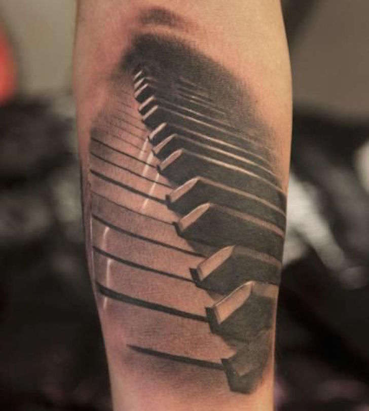 Realistic Piano Keys Tattoo On Forearm