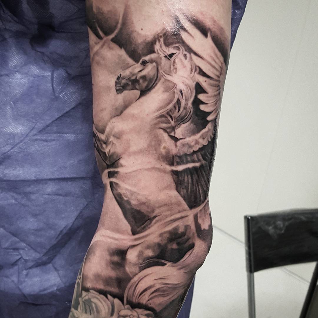 Realistic Grey Color Pegasus Tattoo On Sleeve