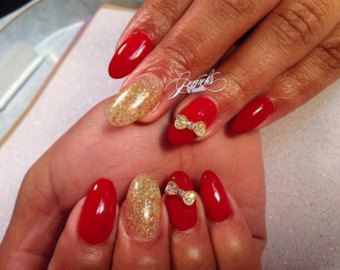Red And Gold Gel Stiletto Nail Art With 3D Bow Design