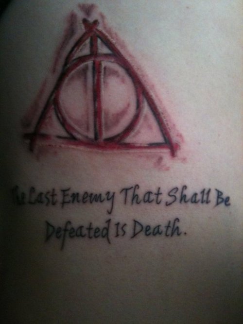 Red Color Deathly Hallows With Black Lettering Tattoo