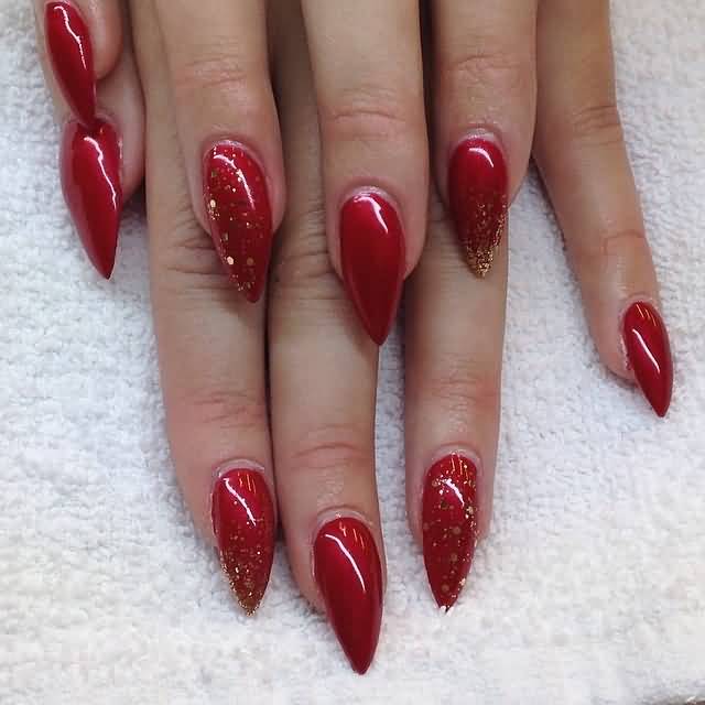 Red Glossy Stiletto Nail Art With Gold Glitter Design