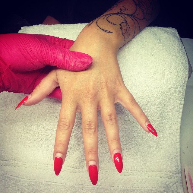 Red Stiletto Nail Art With Reverse French Tip Design Idea