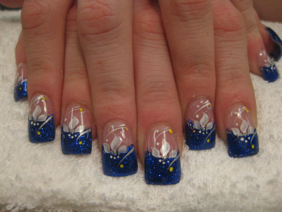 Royal Blue Glitter Gel Tip Nails With White Flowers Nail Art