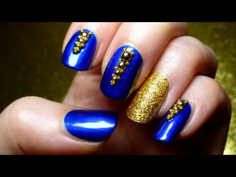 Royal Blue Nails With Accent Gold And Caviar Beads Design Idea