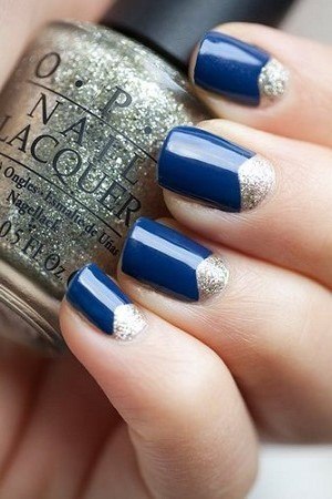 Royal Blue Nails With Silver Reverse French Tip Nail Art Design