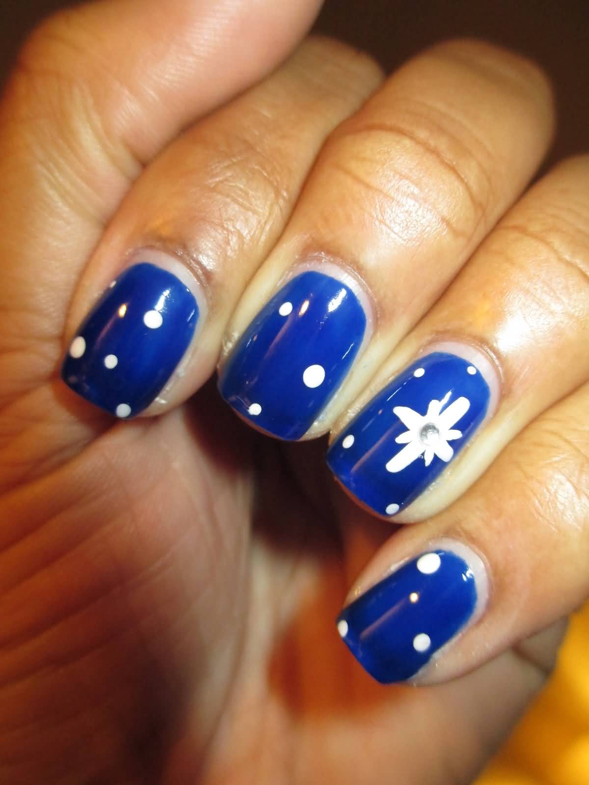 Royal Blue Nails With White Dots And Snowflakes Design Nail Art