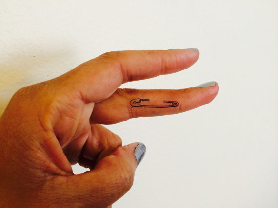 Safety Pin Temporary Tattoo On Finger