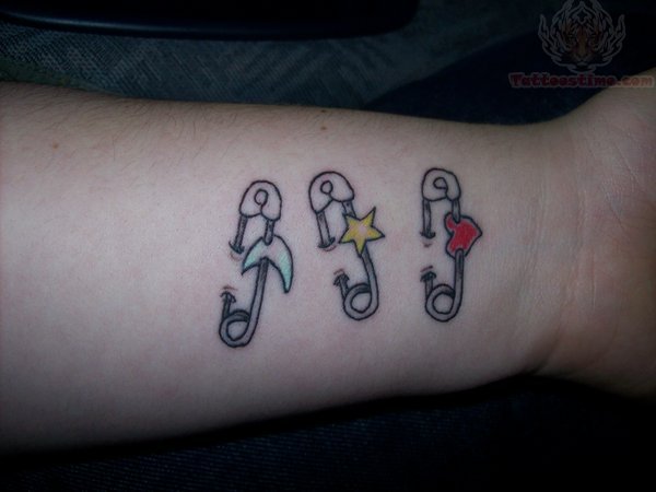 Safety Pins Tattoo On Wrist