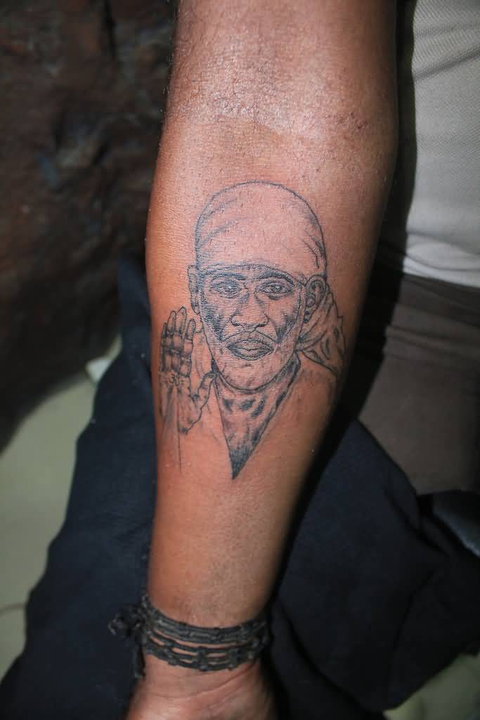 Sai Baba Giving Blessings Tattoo On Forearm