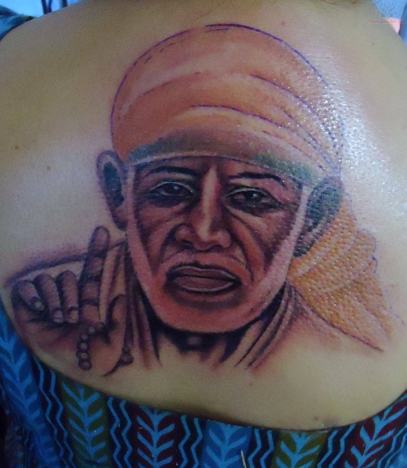 Sai Baba Tattoo On Upper Back