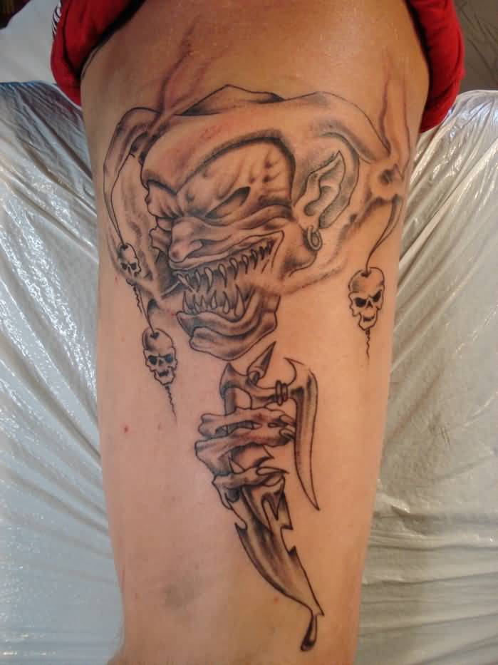 Scary Grey Ink Evil Jester Tattoo On Half Sleeve