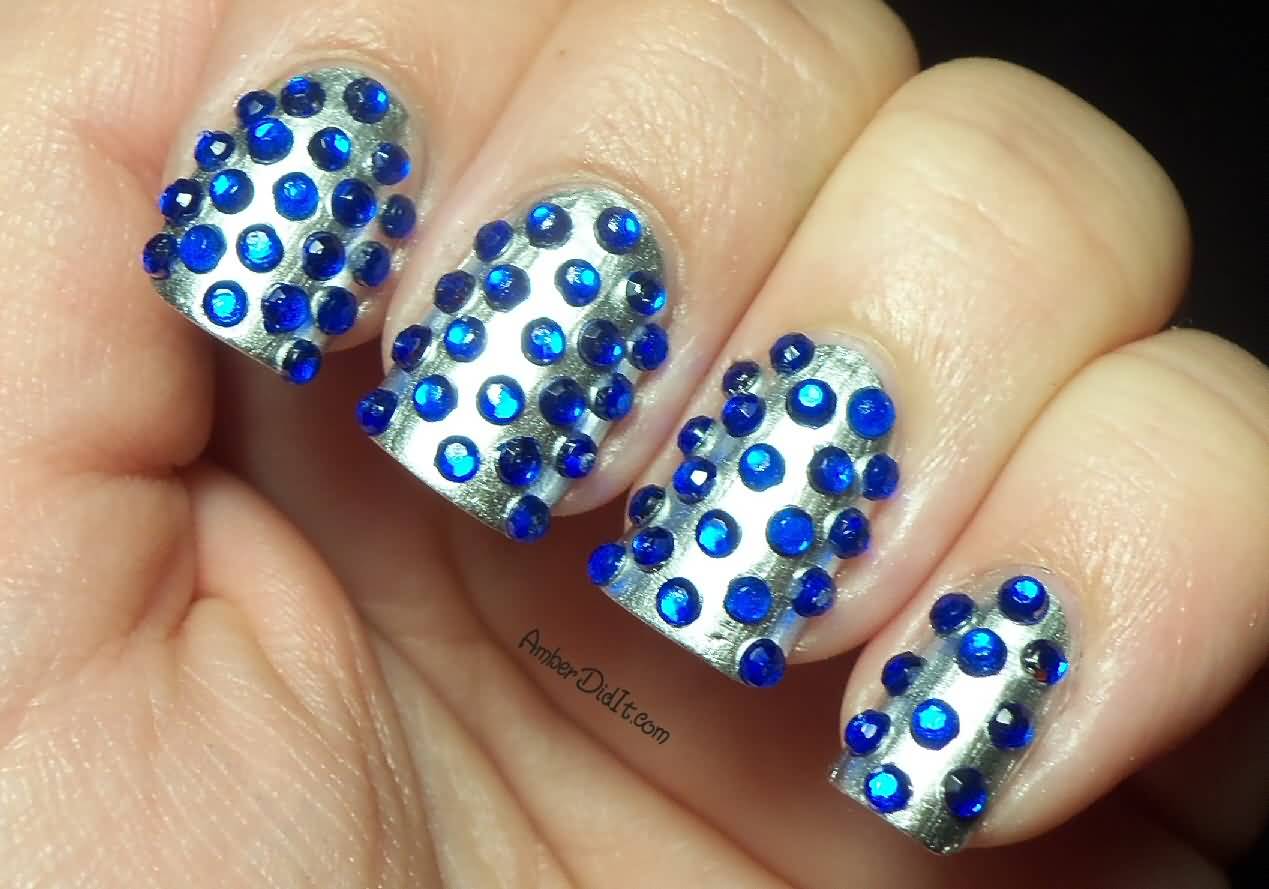 Shiny Silver Base Nails With Blue Rhinestones Design Nail Art
