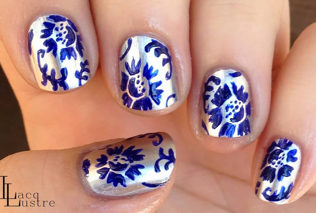 Silver Base Nails With Blue Floral Design Nail Art