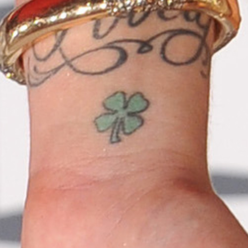 Simple And Small Shamrock Leaf Wrist Tattoo