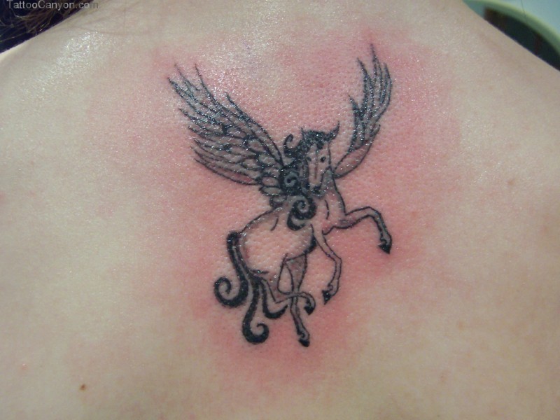 Simple Black And White Pegasus Tattoo On Upper Back