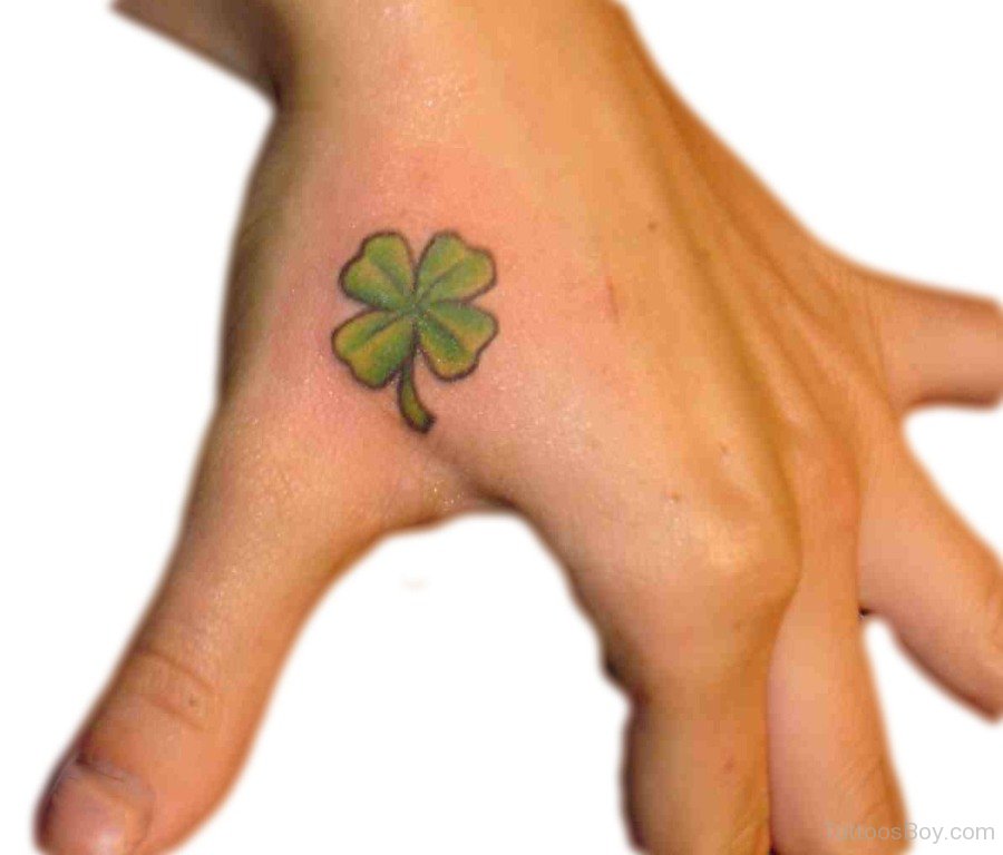 Simple Green Shamrock Leaf Tattoo On Hand