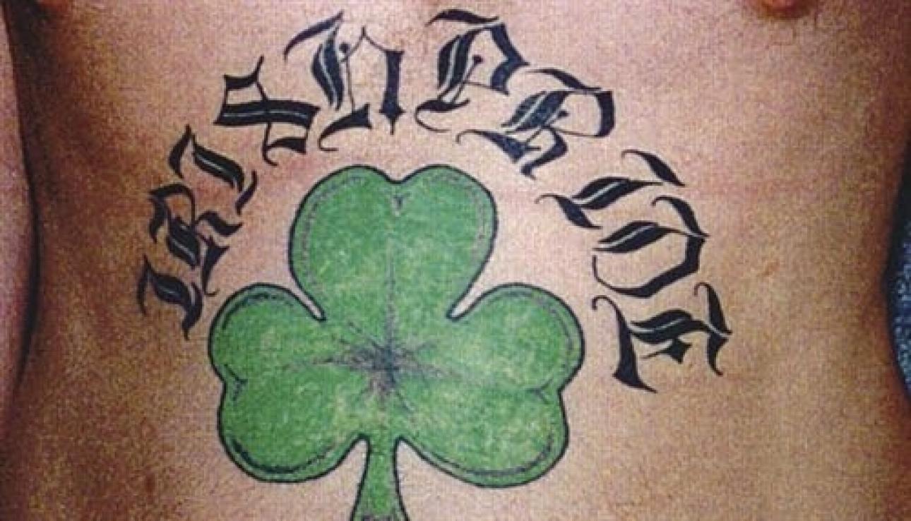 Simple Green Shamrock Leaf With Lettering Tattoo