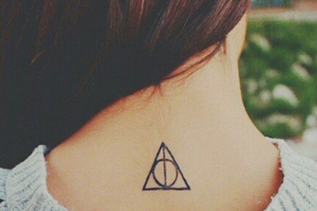 Simple Hallows Tattoo On Upper Back For Girls