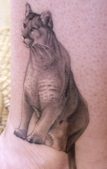 Simple Puma Sitting Tattoo