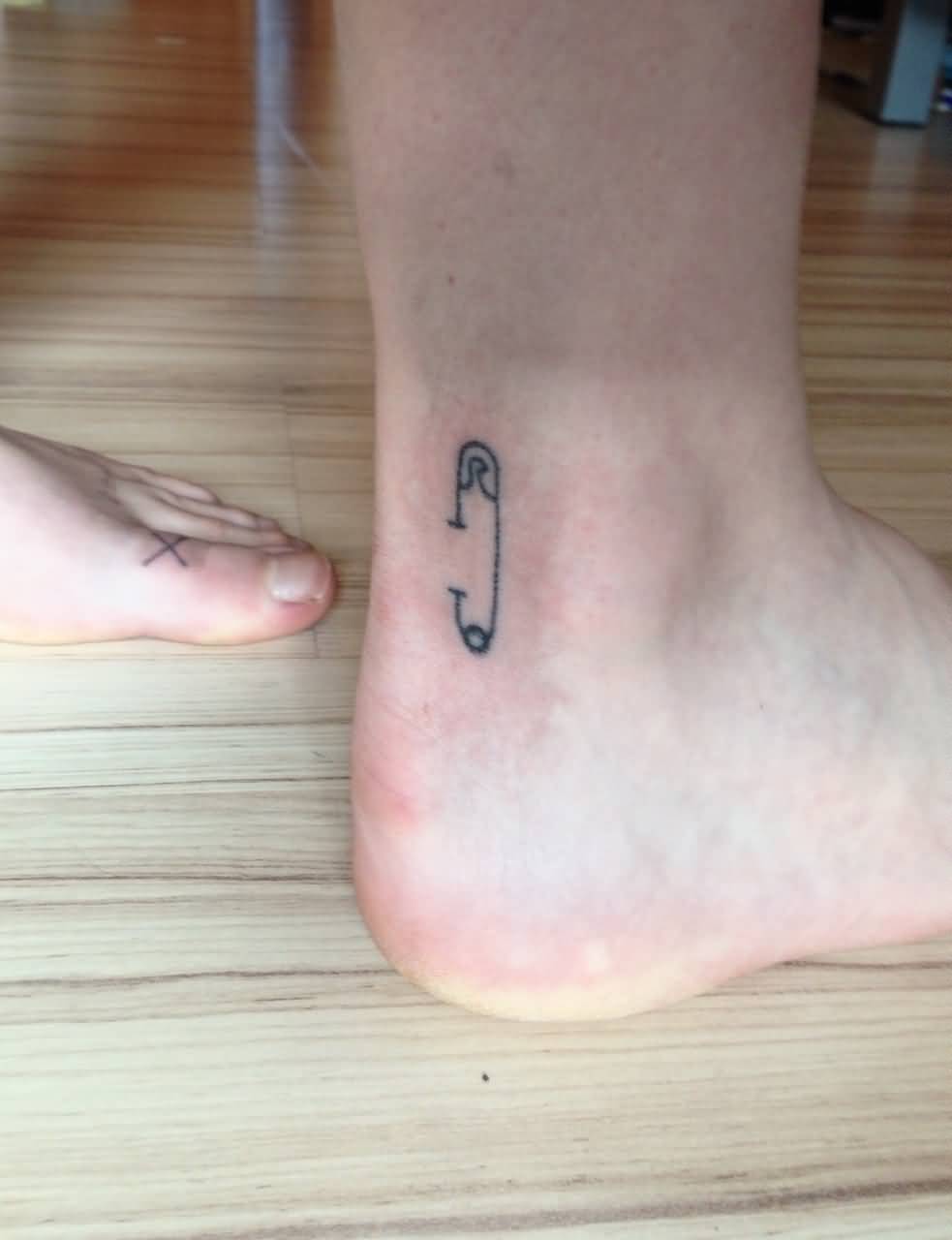 Simple Safety Pin Tattoo On Ankle