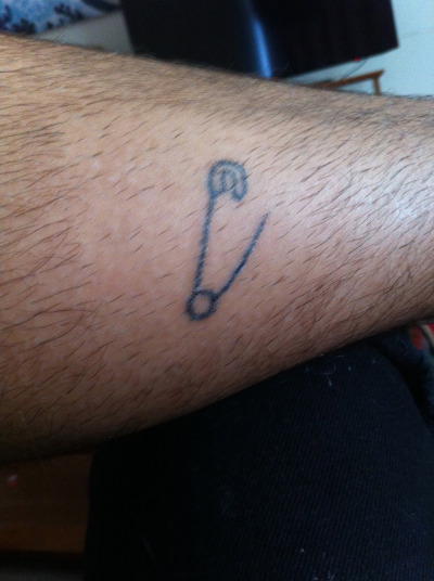 Simple Safety Pin Tattoo On Arm