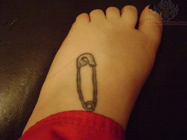 Simple Safety Pin Tattoo On Foot