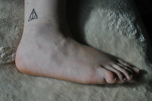 Simple Tiny Hallows Tattoo On Ankle