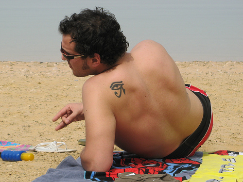 Simple Tiny Horus Eye Tattoo On Left Back Shoulder
