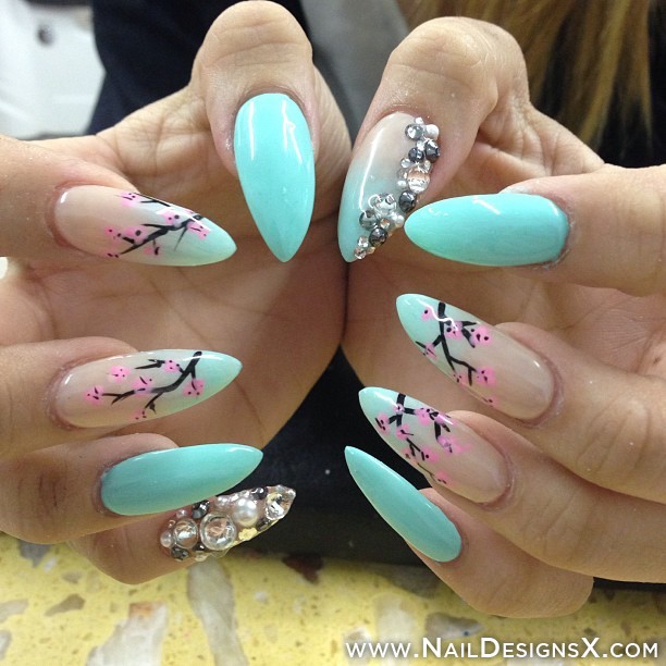 Sky Blue Nails With Rhinestones And Flowers Deign Stiletto Nail Art