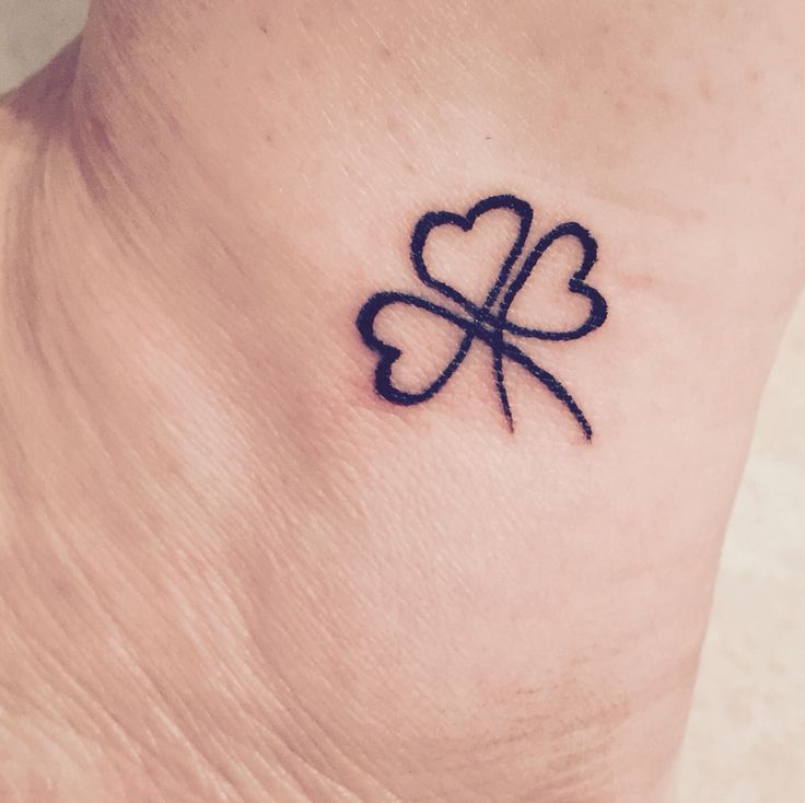 Small Black Outline Shamrock Leaf Tattoo On Ankle