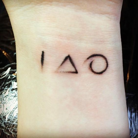 Small Deconstructed Deathly Hallows Tattoo On Wrist