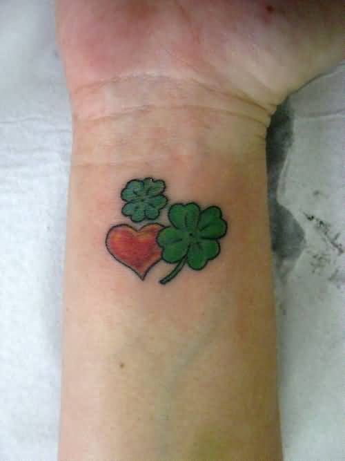Small Four Leaf Shamrock Leaves With Heart Tattoo On Wrist