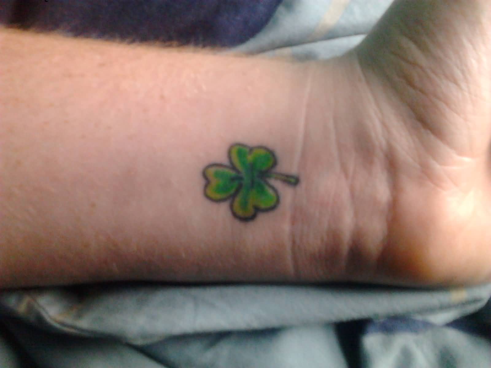 Small Green Shamrock Leaf Tattoo On Wrist