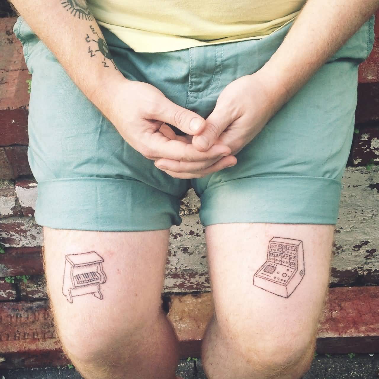 Small Piano With Sythesizer Tattoo On Both Thighs