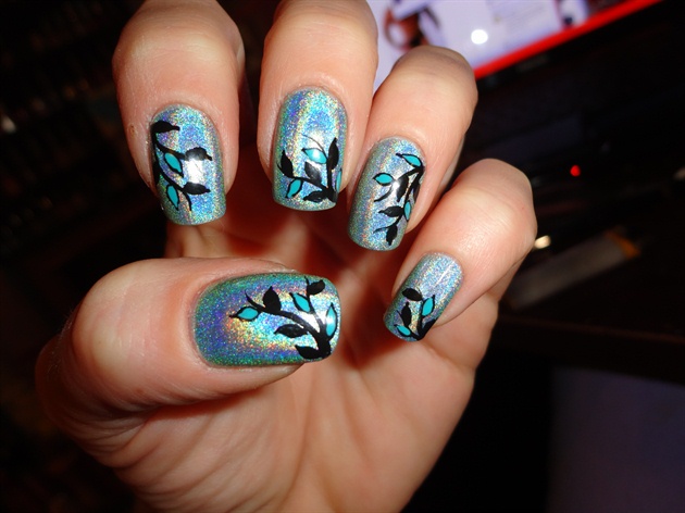 Teal Hologram Nail Art With Tree Leafs Design