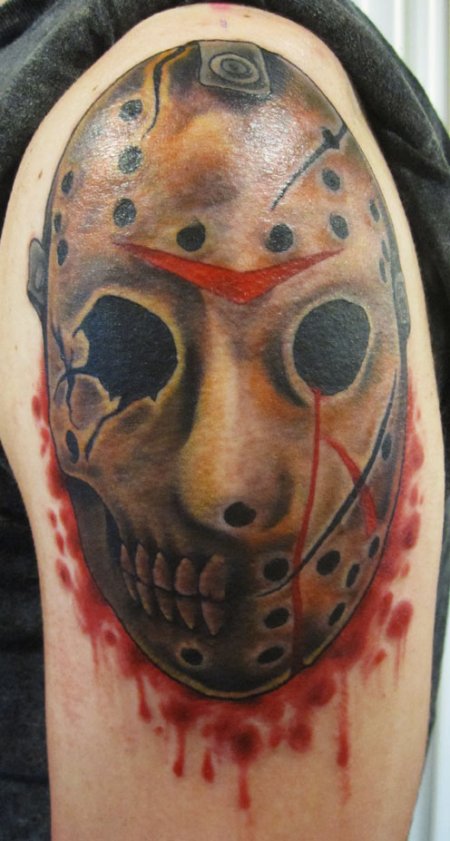 Terrific Jason Mask Colored Tattoo On Left Shoulder