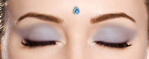 Third Eye Piercing With Blue Stud