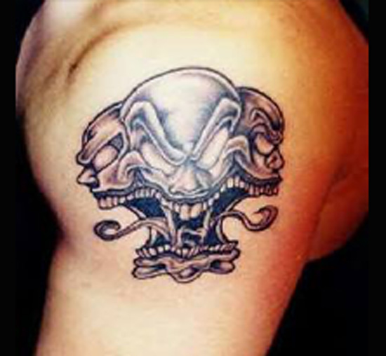 Three Faced Evil Jester Skull Tattoo On Left Shoulder