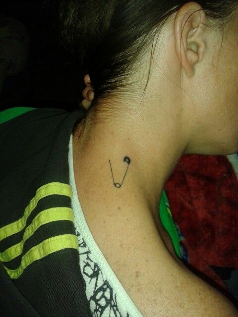 Tiny Safety Pin Tattoo On Side Neck