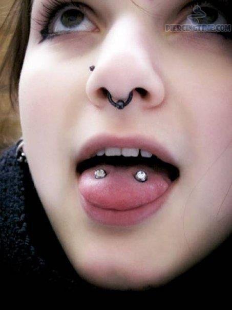 Tongue Piercing And Septum Nose Piercing