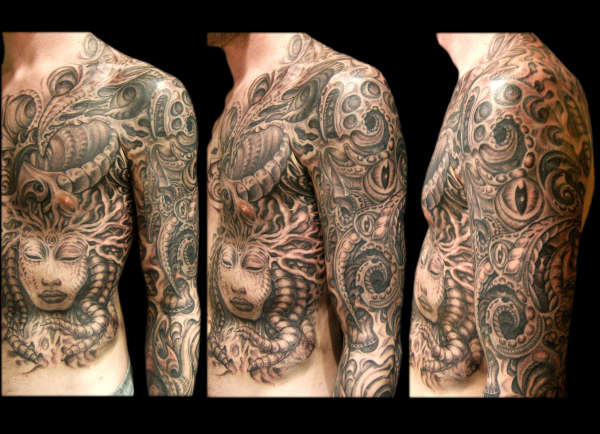 Unique Black And Grey Biomechanical Tattoo On Chest And Shoulder