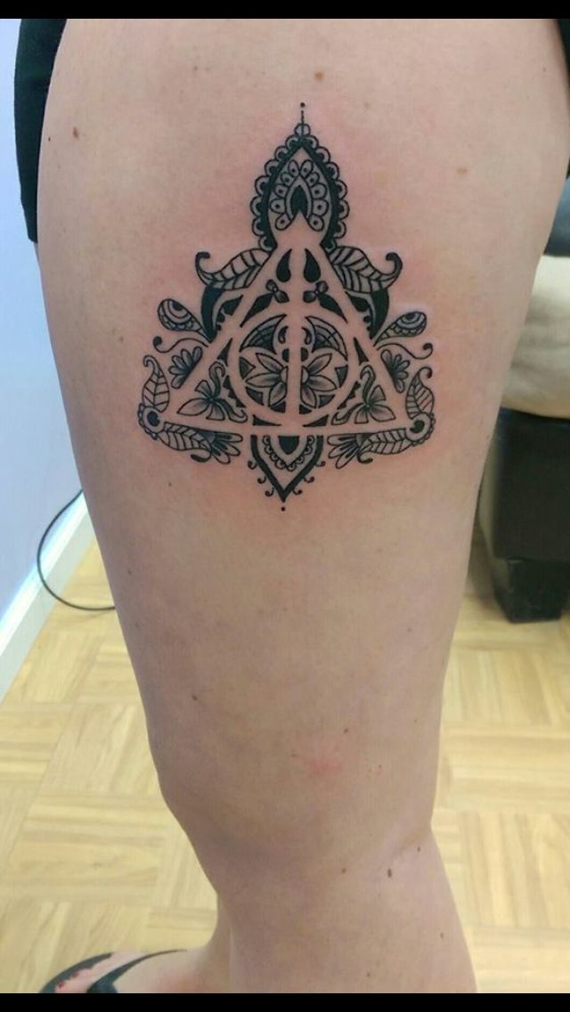 Unique Deathly Hallows Tattoo On Thigh