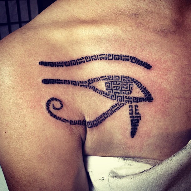 Unique Horus Eye Tattoo On Right Front Shoulder