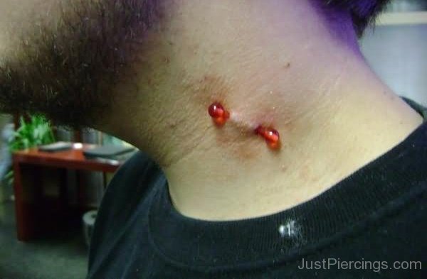 Vampire Bite Piercing With Red Barbell For Men