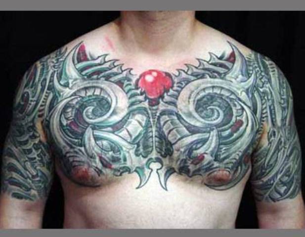 Very Nice Biomechanical Tattoo On Chest And Shoulder