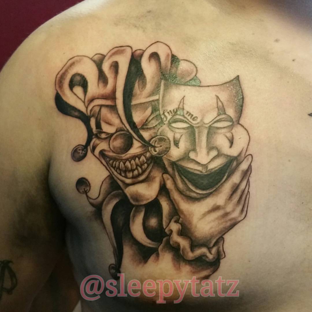 Very Nice Evil Jester Holding Mask Tattoo On Left Right Sleeve