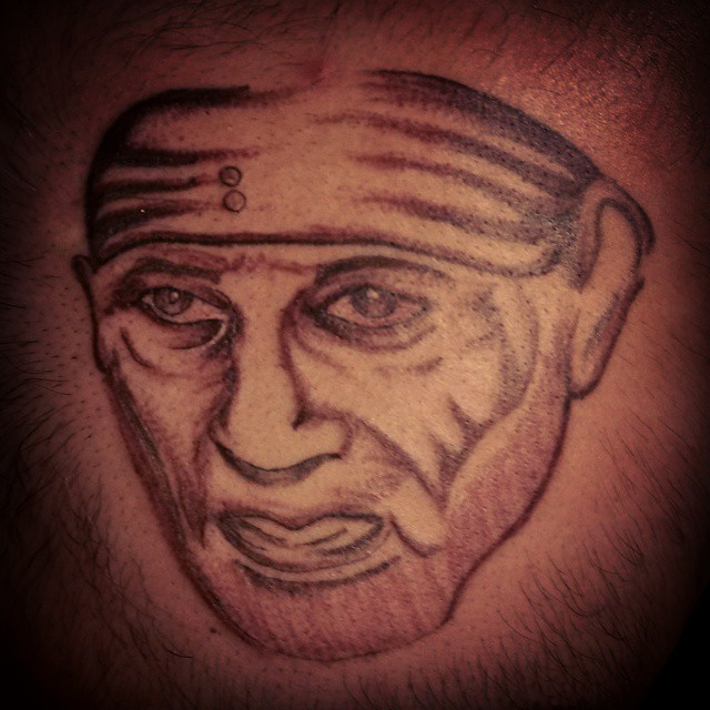 Very Nice Sai Baba Face Tattoo By Sahiltattoo