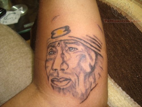 Very Nice Sai Baba Face Tattoo On Arm