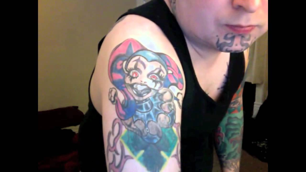 Very Nice Small Jester Colorful Tattoo On Right Half Sleeve